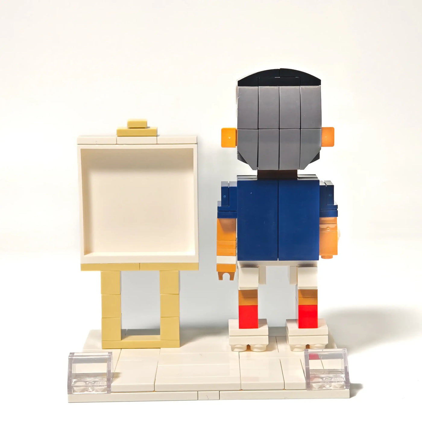 Back view of Popal’s custom Kylian Mbappé brick figurine, featuring the France national team jersey — collectible World Cup figurine.