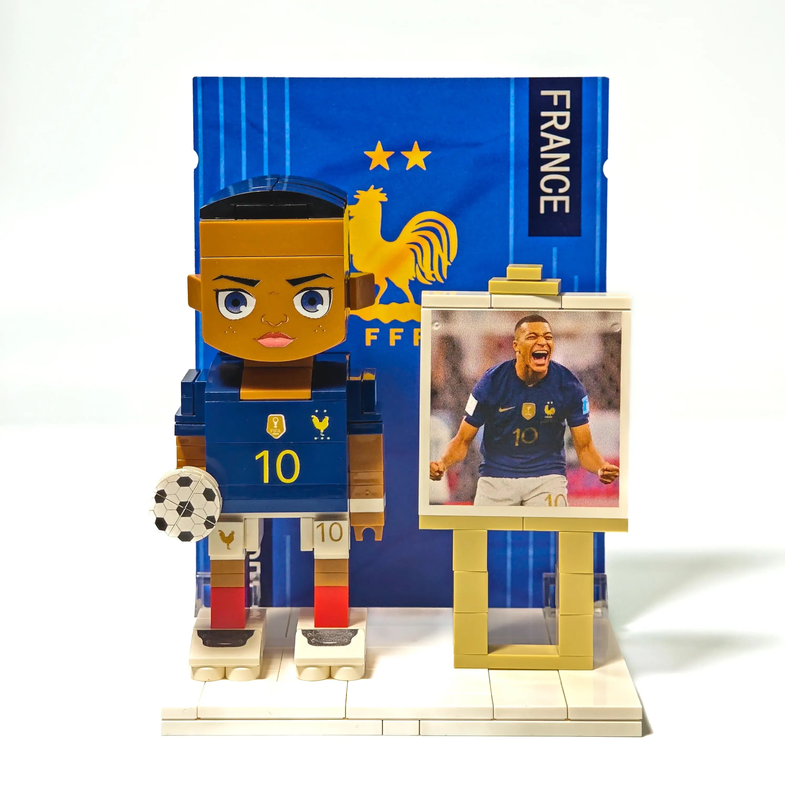 Front view of Popal’s custom Kylian Mbappé brick figurine, featuring detailed printing on a France national team jersey — collectible World Cup figurine.