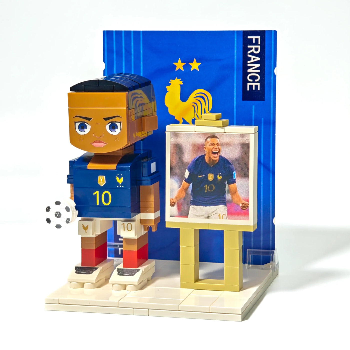 Left side view of Popal’s custom Kylian Mbappé brick figurine, featuring detailed printing on a France national team jersey — collectible World Cup toy