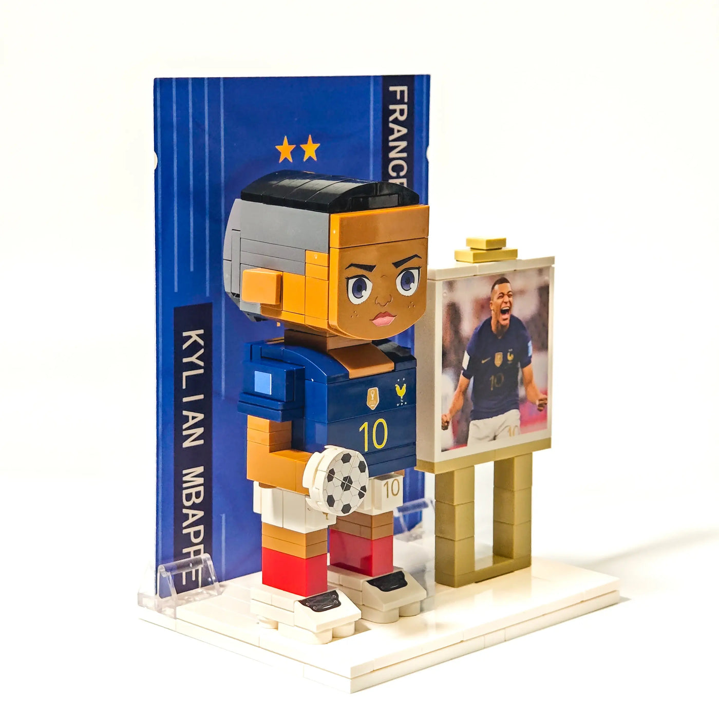 Right side view of Popal’s custom Kylian Mbappé brick figurine, featuring detailed printing on a France national team jersey — collectible World Cup figure