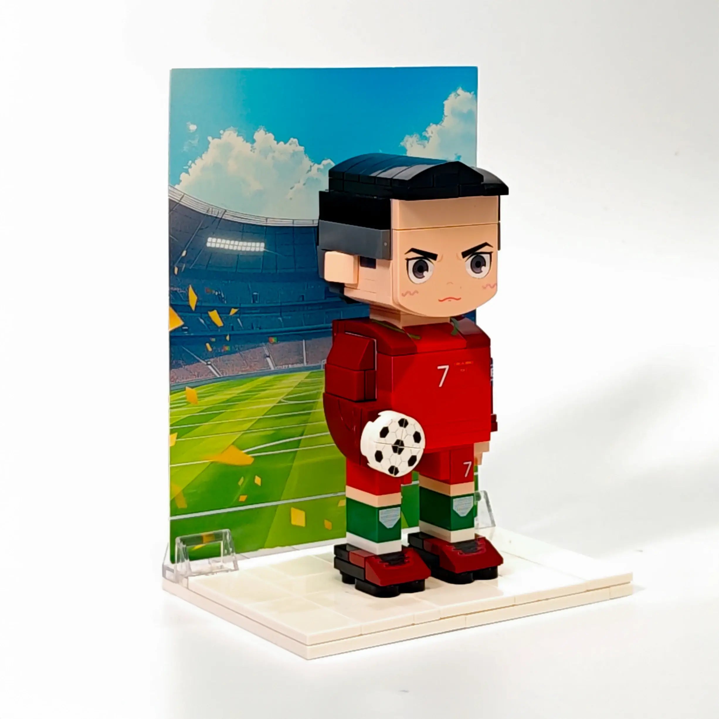 Right-side view of Ronaldo Popal brick figurine in Portugal jersey, holding a football — football legend figurine